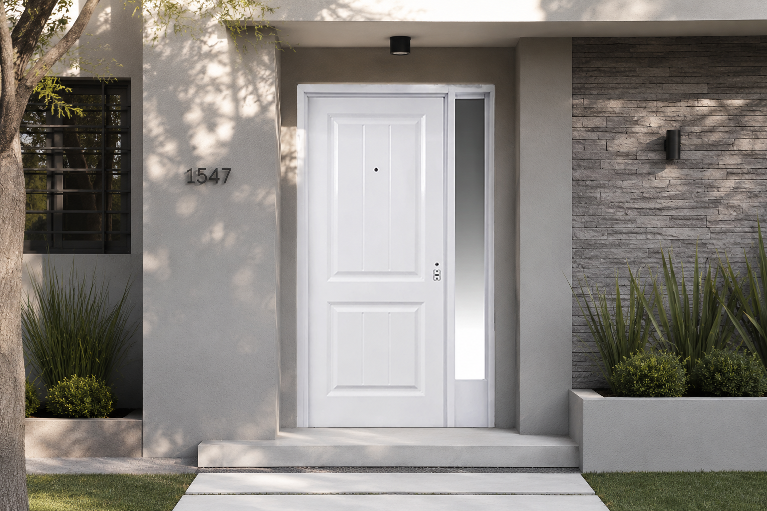 Puerta Barmetal 630 instalada en fachada moderna GBA